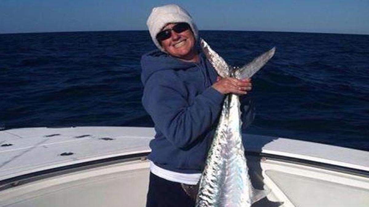 
Michelle Drake with a 78.86 pound king mackerel she and her husband, Jeff, boated to win a recent major tournament at Stock Island, Fla. The fish set a record for a Southern King Association-sanctioned event. The Drakes, from Newport in Carteret County, were fishing alone from their 31-foot boat.
