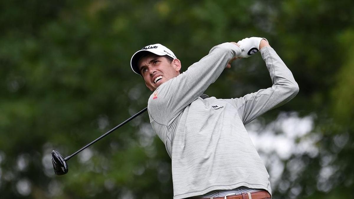 Raleigh’s Chesson Hadley hits his tee shot on the 16th hole during Friday’s second round of the Wells Fargo Championship. He is tied for third place after his 5-under 67 round.