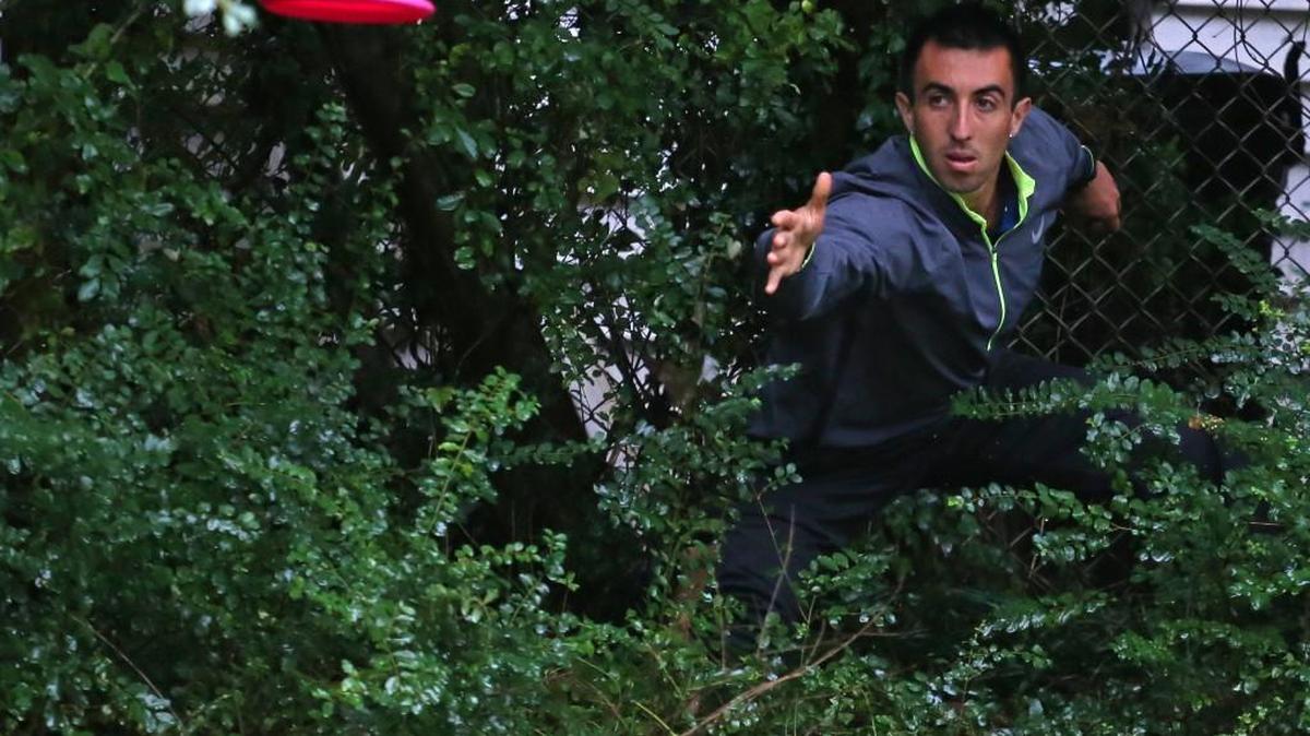 Paul McBeth attempts a putt from the woods on hole 2 during the final round at the U.S. Disc Golf Championship played at Winthrop University Gold Course in Rock Hill, S.C. Saturday Oct. 10, 2015.