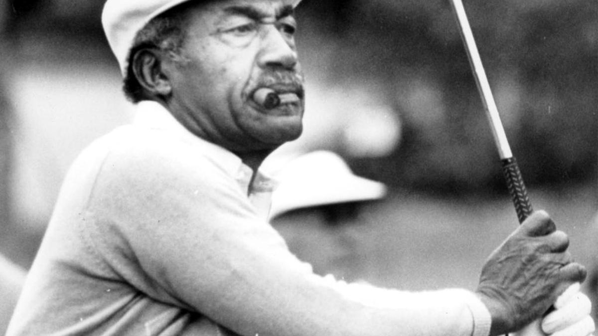 
Charles Sifford plays during the Johnny Mathis Senior golf tournament at MountainGate in March 1986. Sifford died Tuesday, Feb. 3, 2015. He was 92. 
