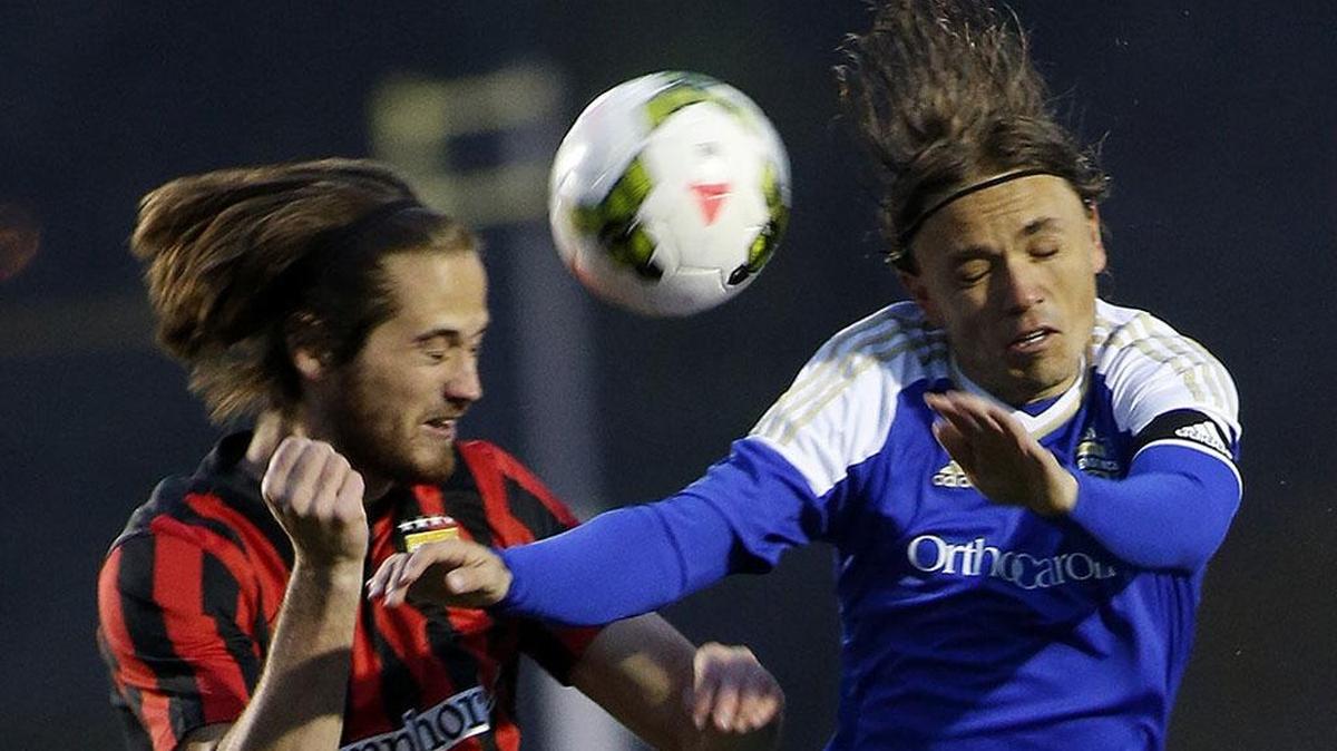 
Charlotte Independence midfielder Jorge Herrera (right, in action earlier this season against the Charleston Battery) and his teammates hope to hand the Rochester Rhinos their first United Soccer League loss Saturday.
