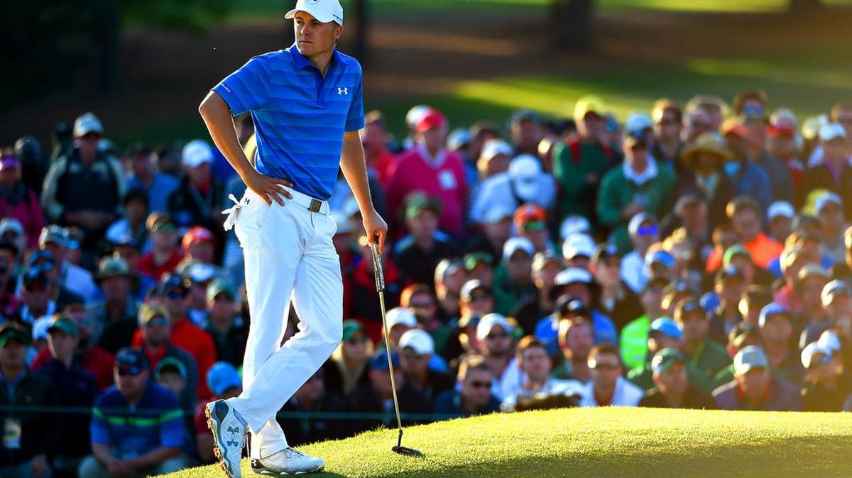 Jordan Spieth looks at the scoreboard from the 18th green during fourth round action in The Masters on Sunday, April 10, 2016 at Augusta National Golf Club in Augusta, GA. Spieth finished the round at -2 tied for second place.