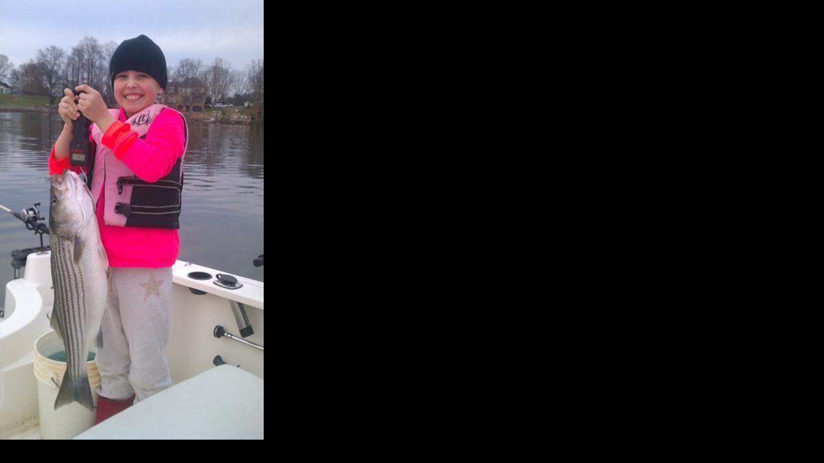 
Payton Frady, 10, with a striped bass she caught last weekend at Lake Norman. The fish weighed 10 pounds, 3 ounces. Payton was fishing with her dad, Kevin Frady, and his friend Keith Harris.



