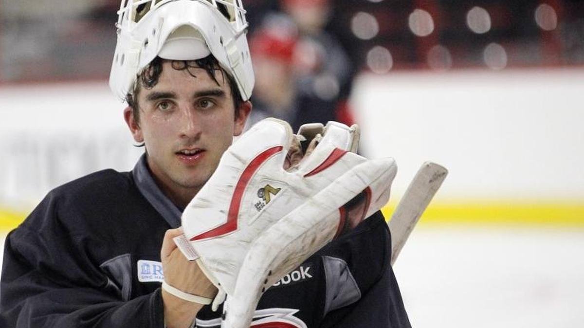 Charlotte Checkers goalkeeper Alex Nedeljkovic made a key stop on a breakaway in Sunday’s overtime win against the Rochester Americans.