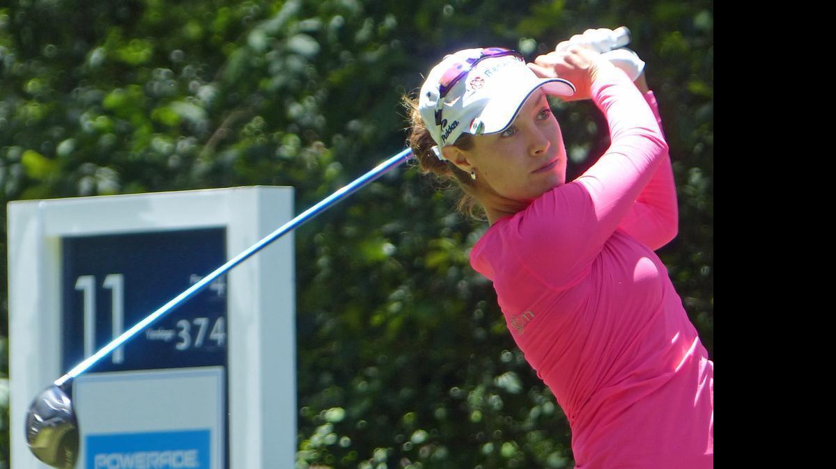 
Alejandra Llaneza hits her shot off the 11th tee during the second round of the Symetra Classic on Friday at Raintree Country Club. Llaneza, the winner of the LPGA Symetra Tour event at Greenwood, S.C., on May 10, leads the Symetra Tour in earnings this season with $35,969. 
