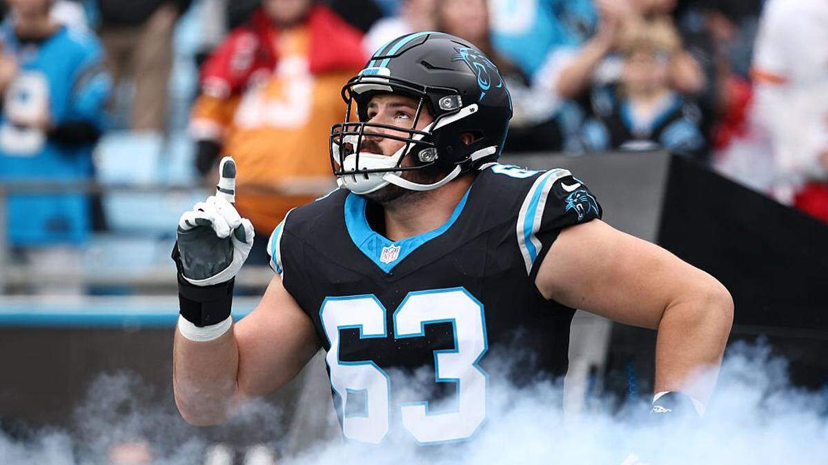 CHARLOTTE, NORTH CAROLINA - DECEMBER 21: Austin Corbett #63 of the Carolina Panthers is introduced prior to the game against the Tampa Bay Buccaneers at Bank of America Stadium on December 21, 2025 in Charlotte, North Carolina. (Photo by Jared C. Tilton/Getty Images)
