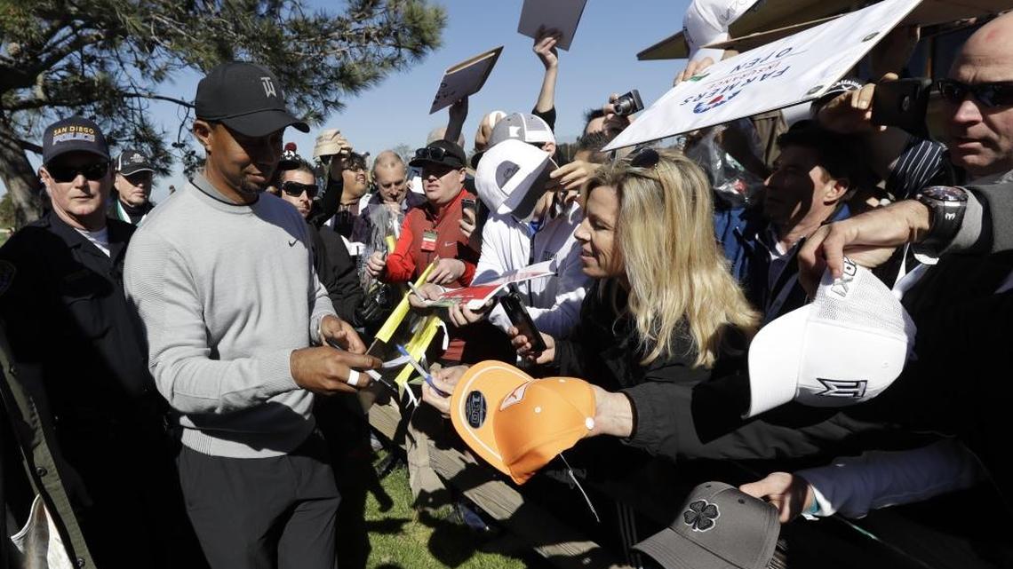 Golfer Tiger Woods, left, was left off a list of the top 50 black athletes of all time.
