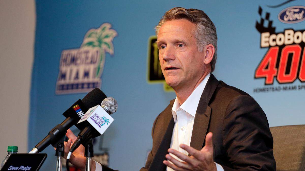 AP file photo: Steve Phelps (right) was named NASCAR president in 2018 and has already made key changes for NASCAR’s future. He spoke about Next Gen safety with NBC analysts at Charlotte Motor Speedway on Sunday, Oct. 9, 2022.