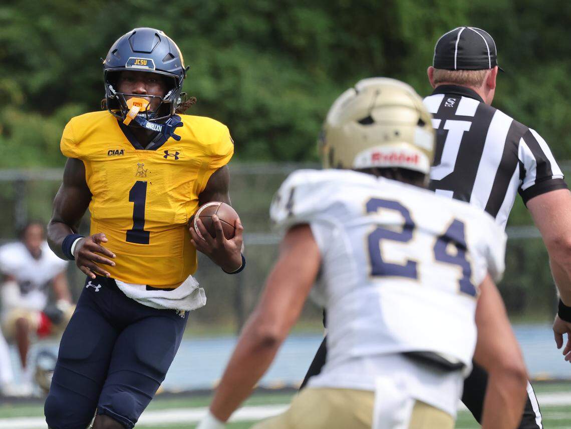 John C. Smith University's Kelvin Durham carries the ball Sept. 27, 2025 in Charlotte as the Golden Bull's compete with Bluefield State