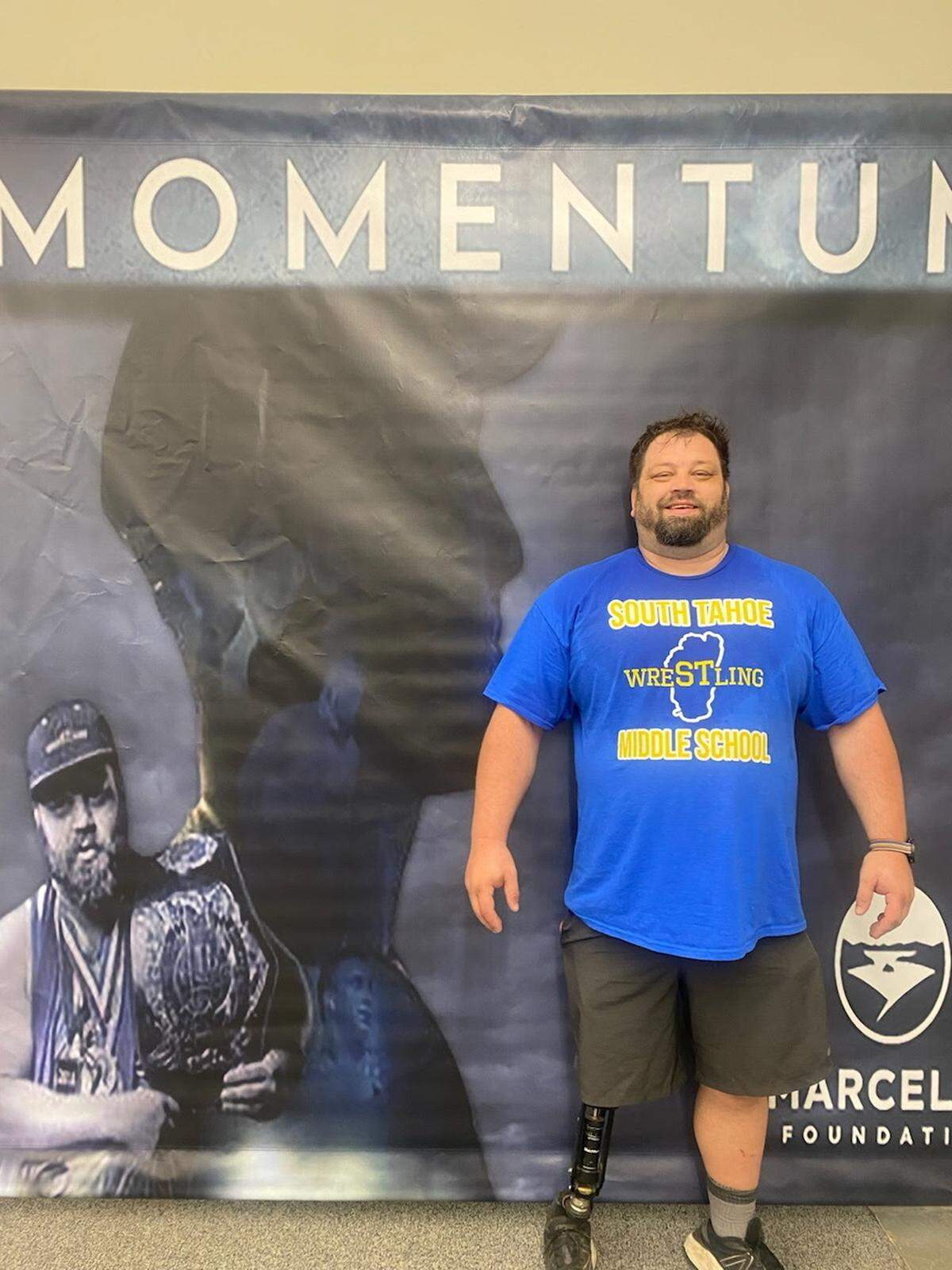 Ryan Wallace, wrestling coach at local high school and middle school in South Tahoe, not far from Reno, Nevada, poses for a photo. He inspired Panthers offensive lineman Austin Corbett 20 years ago. Corbett has been inspiring him since.