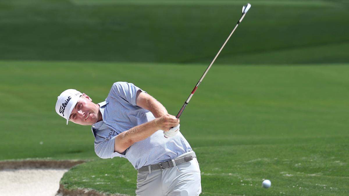Ryan Gerard hits his second shot from a sand trap along the 18th fairway during the opening round of the 107th PGA Championship at Quail Hollow Club in Charlotte, NC on Thursday, May 15, 2025.