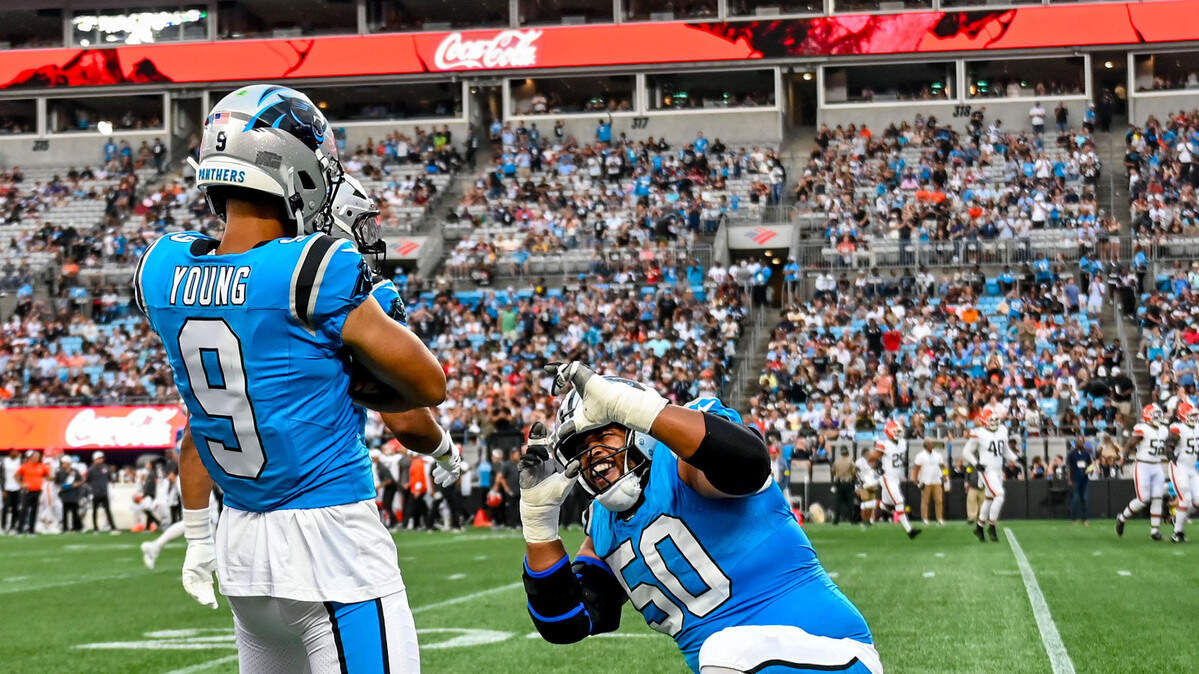 The Carolina Panthers QB Bryce Young and offensive guard Robert Hunt celebrate a touchdown during their first preseason game against The Cleveland Browns at The Bank of America Stadium in Charlotte, NC, Friday, August 8, 2025.