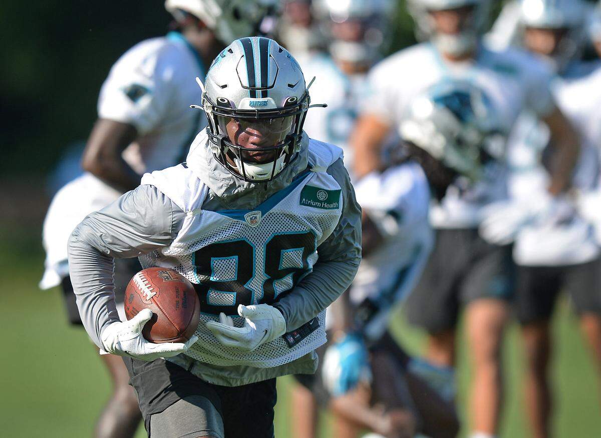 Carolina Panthers wide receiver Terrace Marshall Jr. rushes the ball downfield after catching a pass during practice at Wofford College in Spartanburg, SC on Wednesday, July 28, 2021.