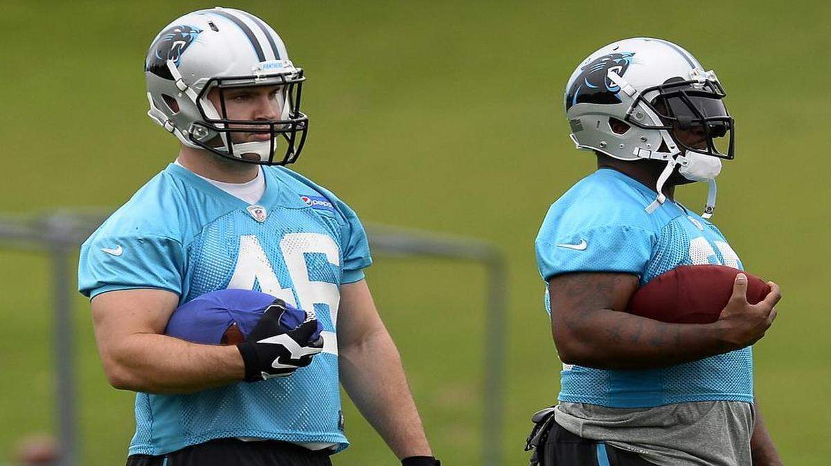 
For the Carolina Panthers, undrafted rookie Lee Ward, left, and veteran Mike Tolbert, right, are the only fullbacks on the roster. That means Ward has to carry Tolbert’s helmet, for now. 
