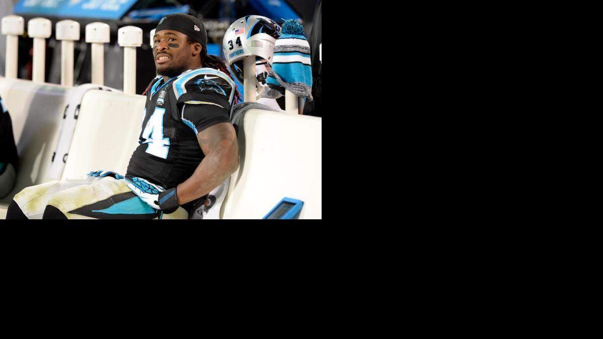 
Carolina Panthers’ DeAngelo Williams (34) looks toward the field near the end of the game against the New Orleans Saints at Bank of America Stadium on  Oct.  30, 2014. The Saints won 28-10. 
