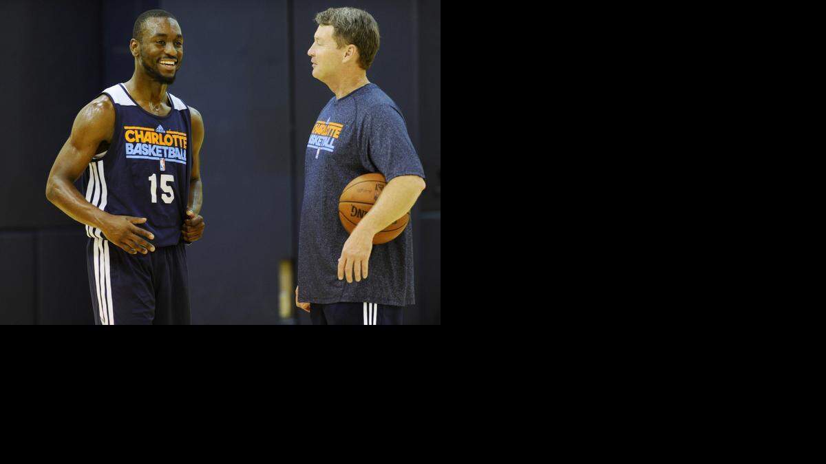 
Mark Price helped Charlotte Hornets players like Kemba Walker, here in 2013. So why are Charlotte 49ers players leaving since Price was hired as head coach?
