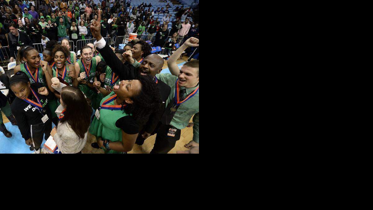 
The Myers Park Mustangs celebrate their victory over Southeast Raleigh in the 4A championship Saturday night. On Tuesday, Myers Park will appeal an NCHSAA rule that currently will not allow them to play in a national tournament in New York City.

