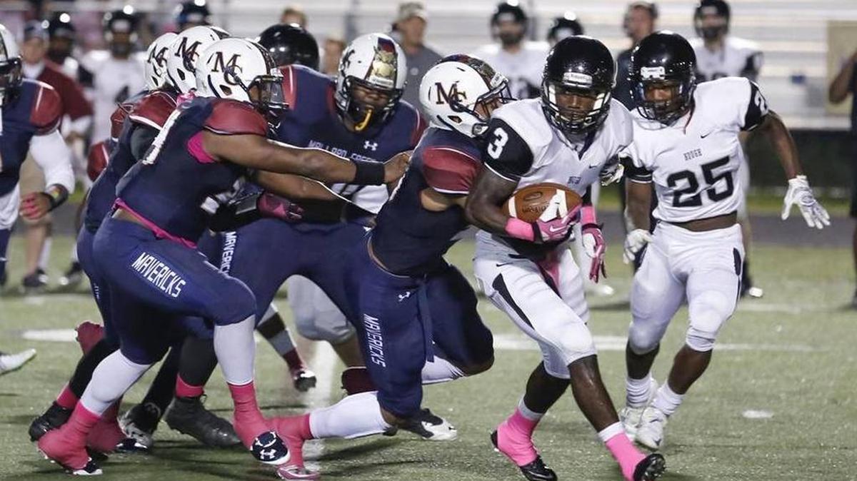 
Hough’s Marquill Osborne sealed the Huskies 31-28 win over No. 1 Mallard Creek with an overtime interception Friday
