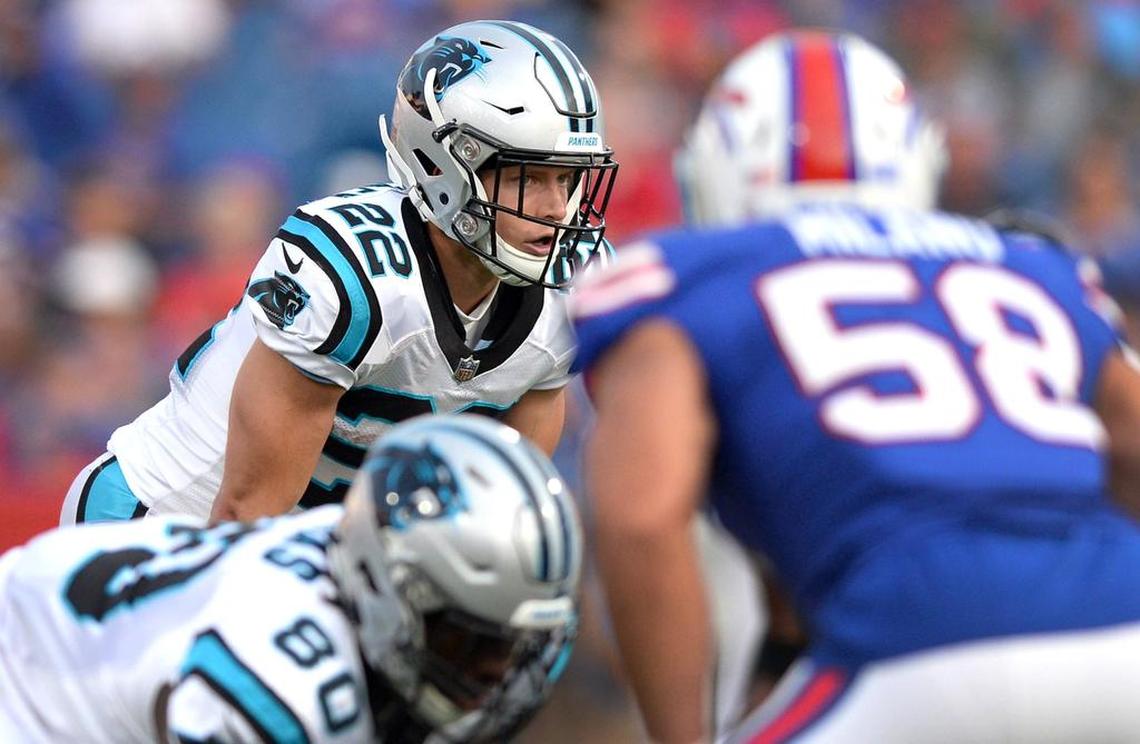 Carolina Panthers running back Christian McCaffrey (left) is a solid late first-round pick in fantasy football drafts.