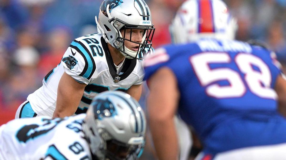 Carolina Panthers running back Christian McCaffrey (left) is a solid late first-round pick in fantasy football drafts.