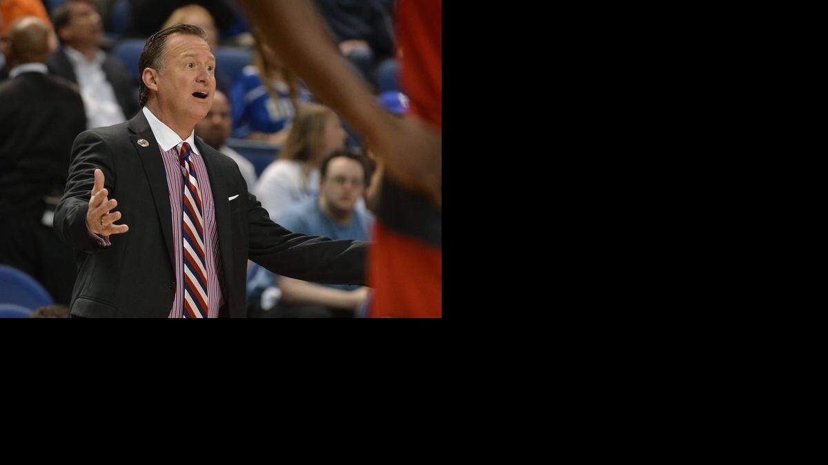 
N.C. State head coach Mark Gottfried pleads with game officials for a call at the ACC tournament in Greensboro, March 12, 2015.

