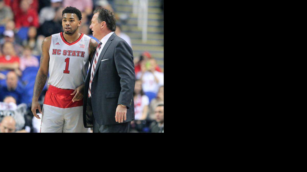 
N.C. State’s coach Mark Gottfried talks with Trevor Lacey (1) on Wednesday.


