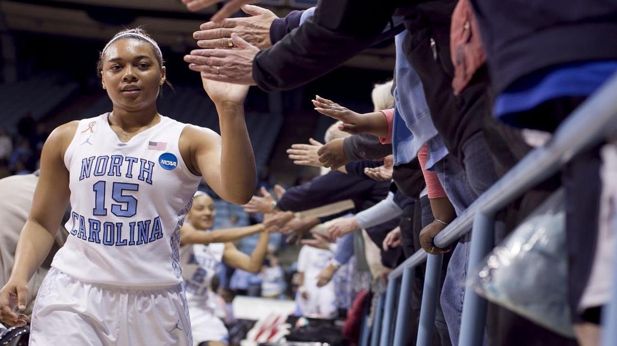 
UNC's Allisha Gray (15) celebrates the Tar Heels' 62-53 victory over Michigan State with fans on March 25, 2014, in Chapel Hill. Gray, the leading scorer on the women’s basketball team last season, has received permission to explore a transfer.
