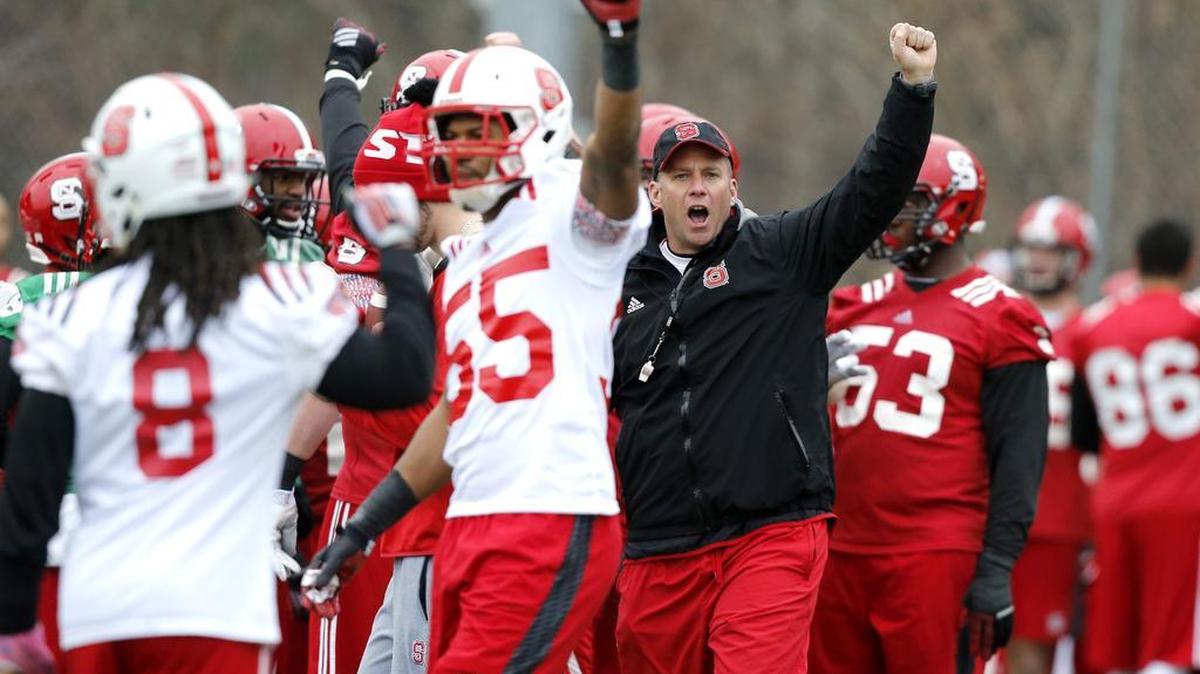 
N.C. State head coach Dave Doeren yells to his team during N.C. State football's first spring practice at the Dail football practice complex in Raleighon March 3.
