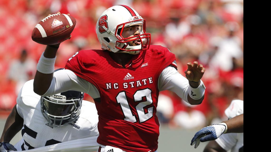 
N.C. State is probably a year away from being a serious threat, but has a comfortable schedule and quarterback Jacoby Brissett (12).


