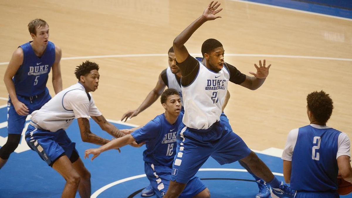 
Duke freshman Chase Jeter (2) attempts to inbound a pass as Amile Jefferson (21), Matt Jones and freshman Brandon Ingram defend against freshmen Luke Kennard (5) and Derryck Thornton (12) Friday, October 2, 2015 during an intraquad scrimmage at Cameron Indoor Stadium. 
