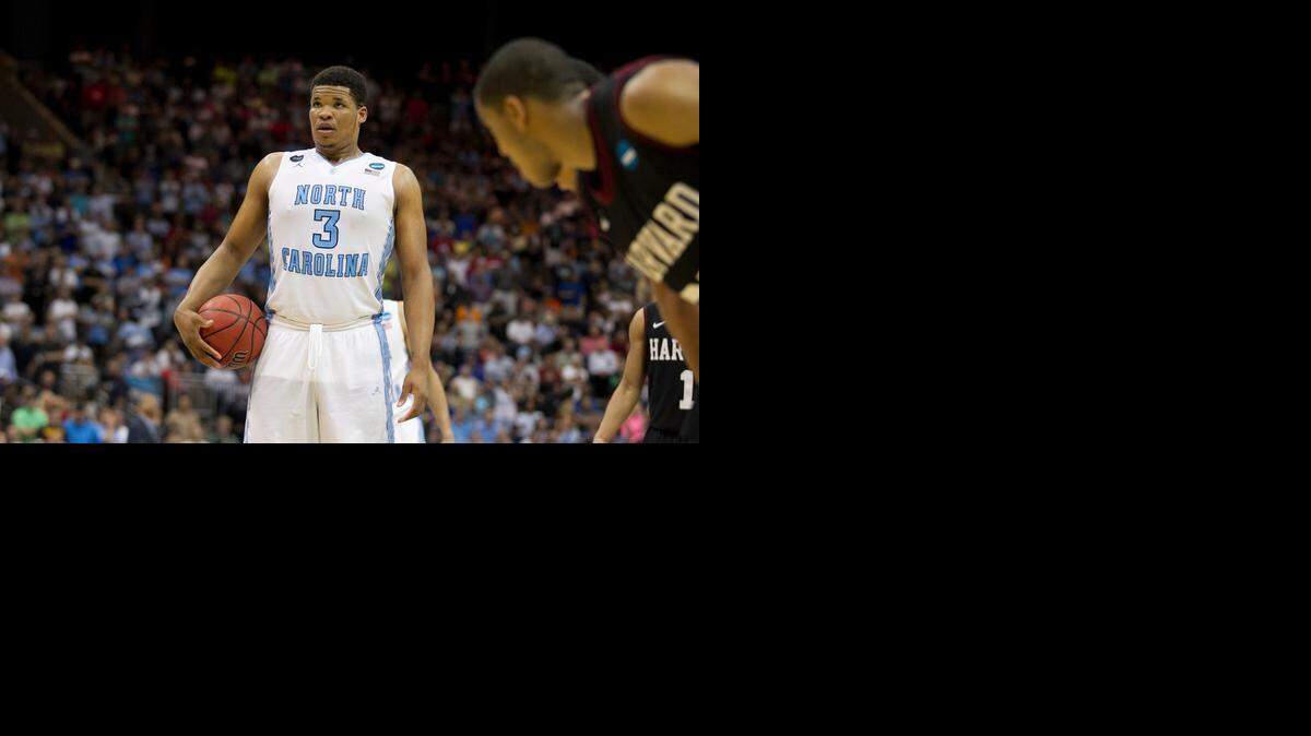 
North Carolina’s Kennedy Meeks concentrates on the basket from the free throw line with 12 seconds to play against Harvard during the second half of their third-round game in Jacksonville, Fla.

