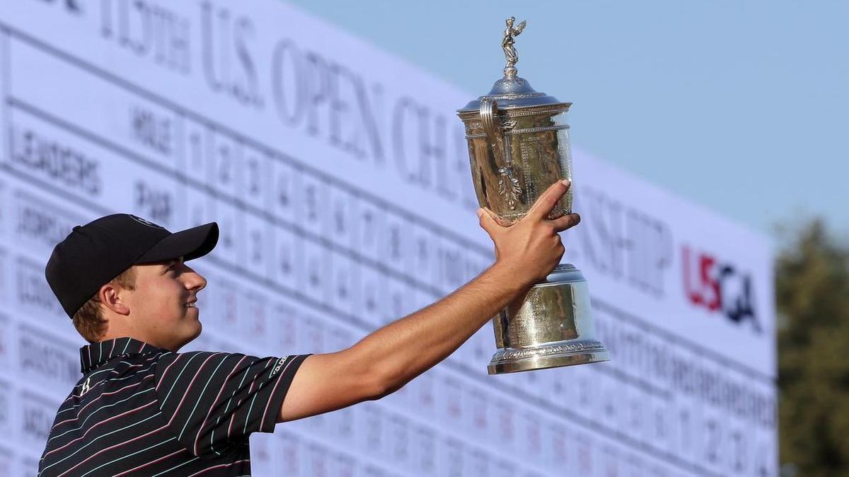 
Jordan Spieth poses with the trophy after winning the U.S. Open on June 21, 2015.

