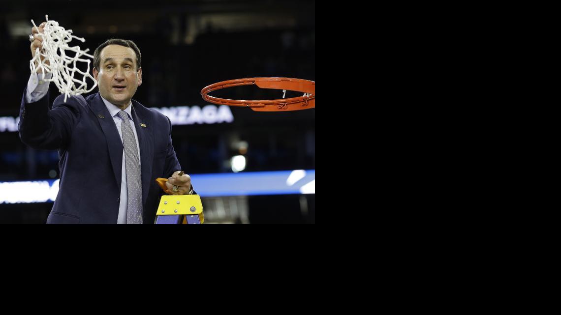 
Duke head coach Mike Krzyzewski cuts down the net after his team defeated Gonzaga 66-52 in the NCAA Tournament on Sunday to advance to the Final Four. Krzyzewski has coached Duke to the national championship four times, the last in 2010. 

