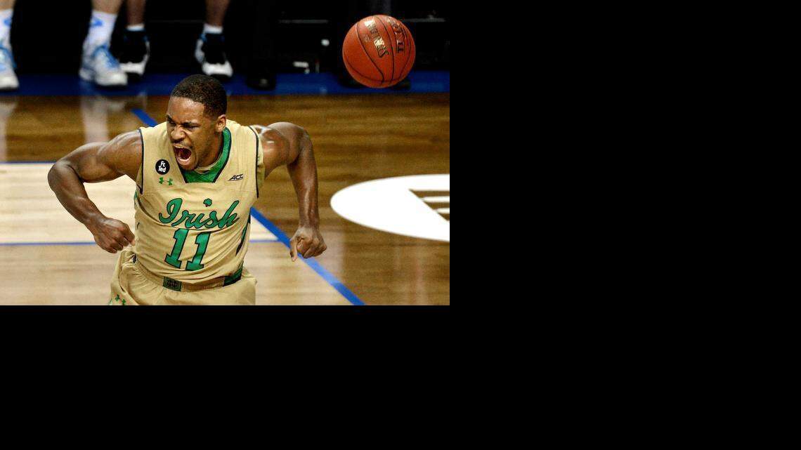 
Notre Dame guard Demetrius Jackson  lets out a shout after a first-half dunk against the Tar Heels. The Fighting Irish beat North Carolina 90-82 Saturday night to win the ACC Championship. 
