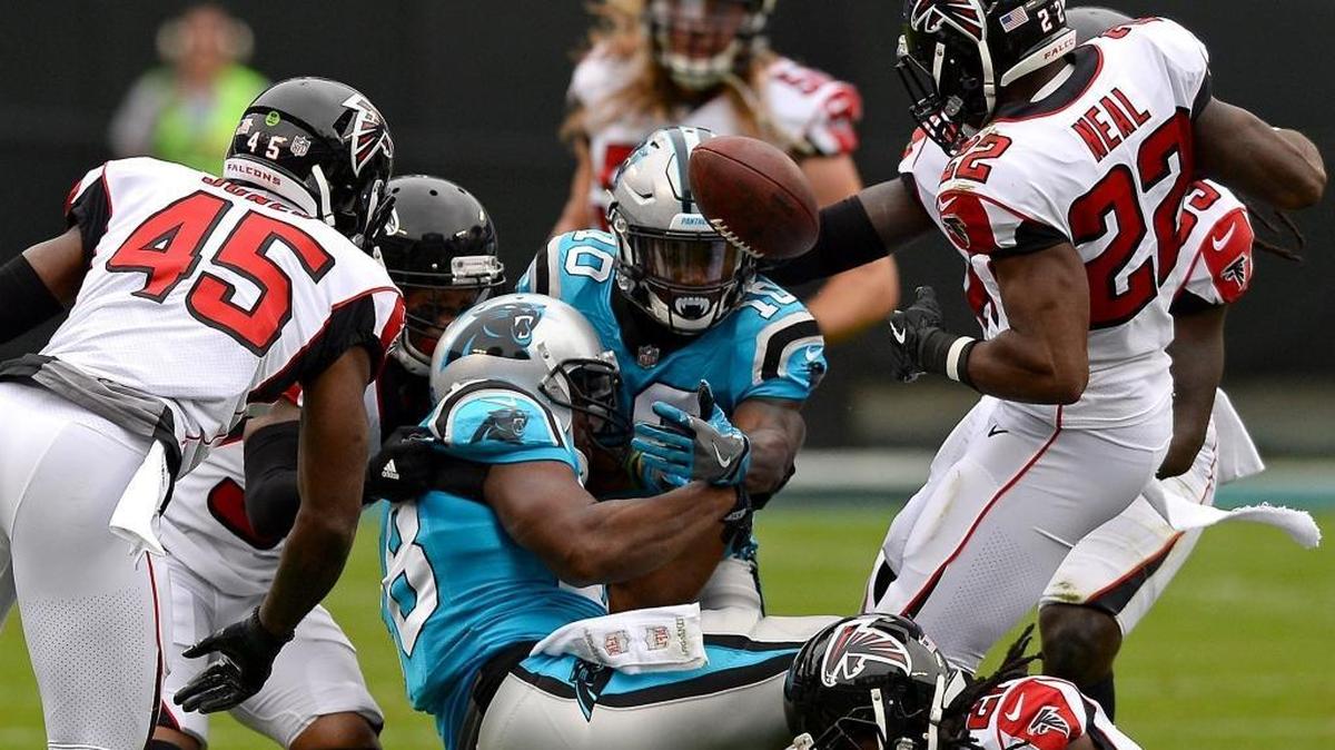Carolina Panthers running back Jonathan Stewart (center, falling to ground) lost two fumbles in a three-carry span Sunday in the first quarter against Atlanta. Carolina still won, 20-17.