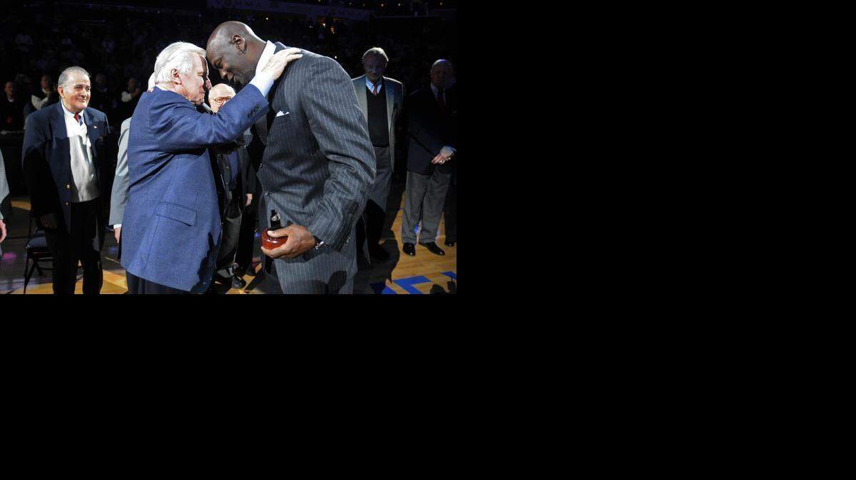 
Dean Smith with Michael Jordan after Jordan’s induction into the N.C. Sports Hall of Fame in 2010. Ex-Tar Heel star Billy Cunningham remembers Smith getting irritated when Cunningham suggested Jordan, then a freshman named Mike, could become the Tar Heels’ best ever. Smith looked at everyone as an equal, Cunningham says.
