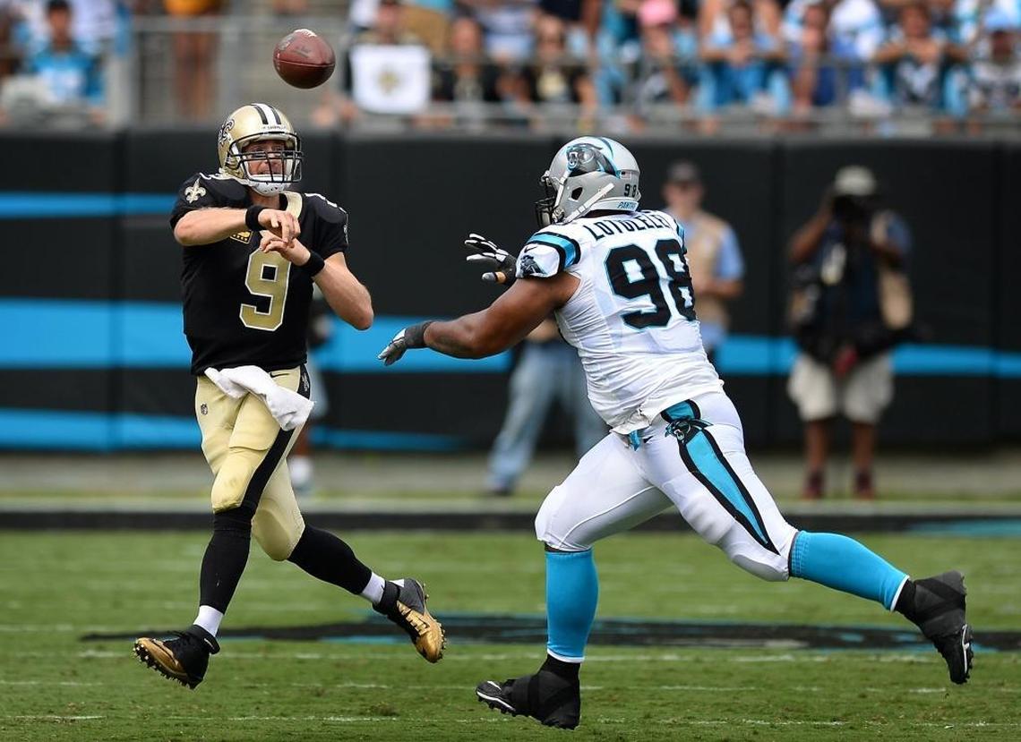 New Orleans quarterback Drew Brees -- being chased by Panthers defensive tackle Star Lotulelei in September -- led the Saints to a 34-13 win over Carolina 10 weeks ago.