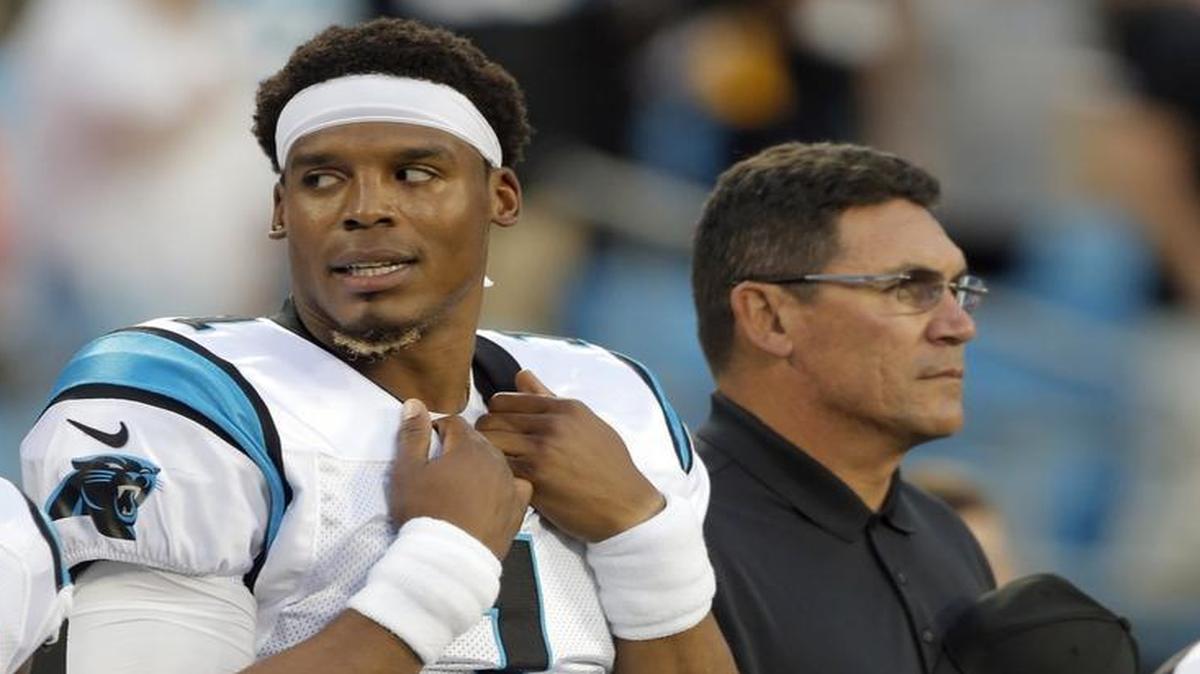 Carolina’s Cam Newton (left) dressed but did not play Thursday night in Carolina’s final exhibition vs. Pittsburgh. Newton threw a total of two passes in the Panthers’ four preseason games.