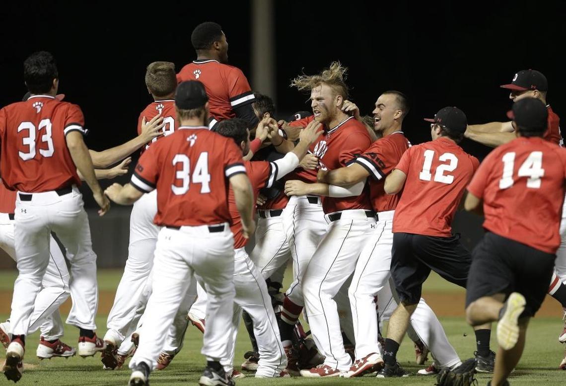 Davidson players celebrated after defeating North Carolina 2-1 in an NCAA college baseball tournament regional game in Chapel Hill Sunday. Making its first NCAA tourney appearance ever, Davidson eliminated the Tar Heels to advance to the final 16.