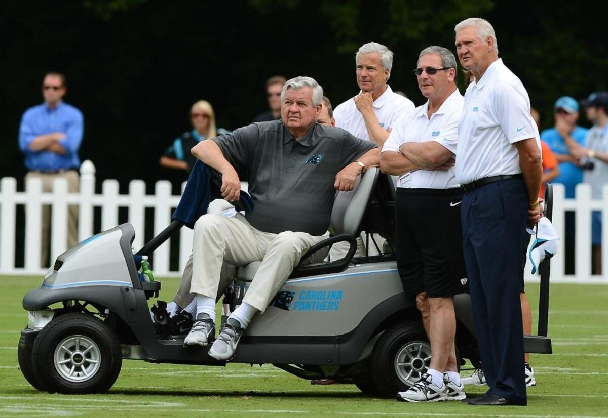 (L-R) Carolina Panthers owner Jerry Richardson, president Danny Morrison, general manager Dave Gettleman and NBA legend Jerry West watched a team practice together in 2013. Morrison resigned in early 2017. Gettleman was fired by Richardson in July. And Richardson announced his intent to sell the Panthers in December.