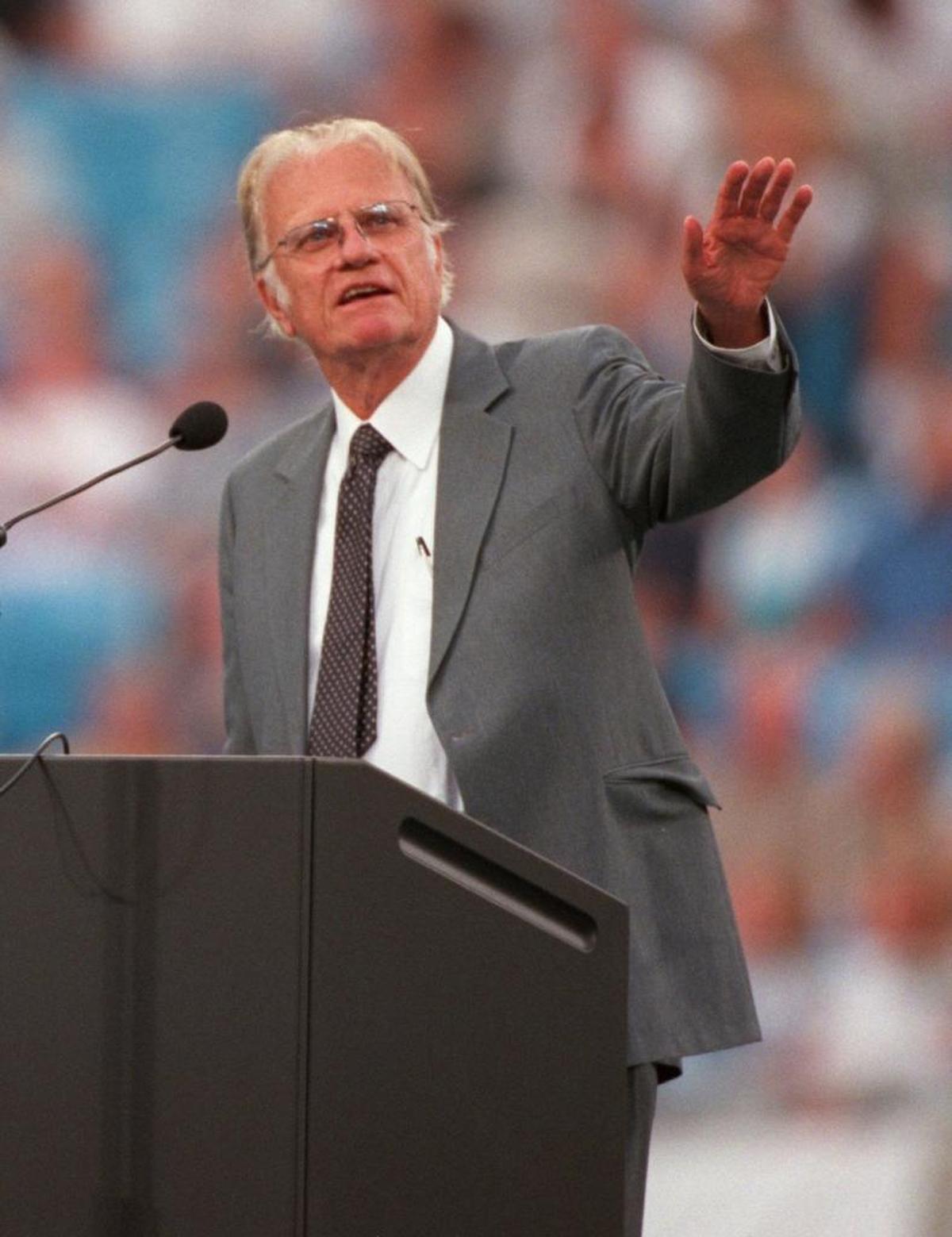 In this Aug. 18, 1996 photo, Bill Graham greets the crowd during the dedication at Ericsson Stadium, which later became Bank of America Stadium.
