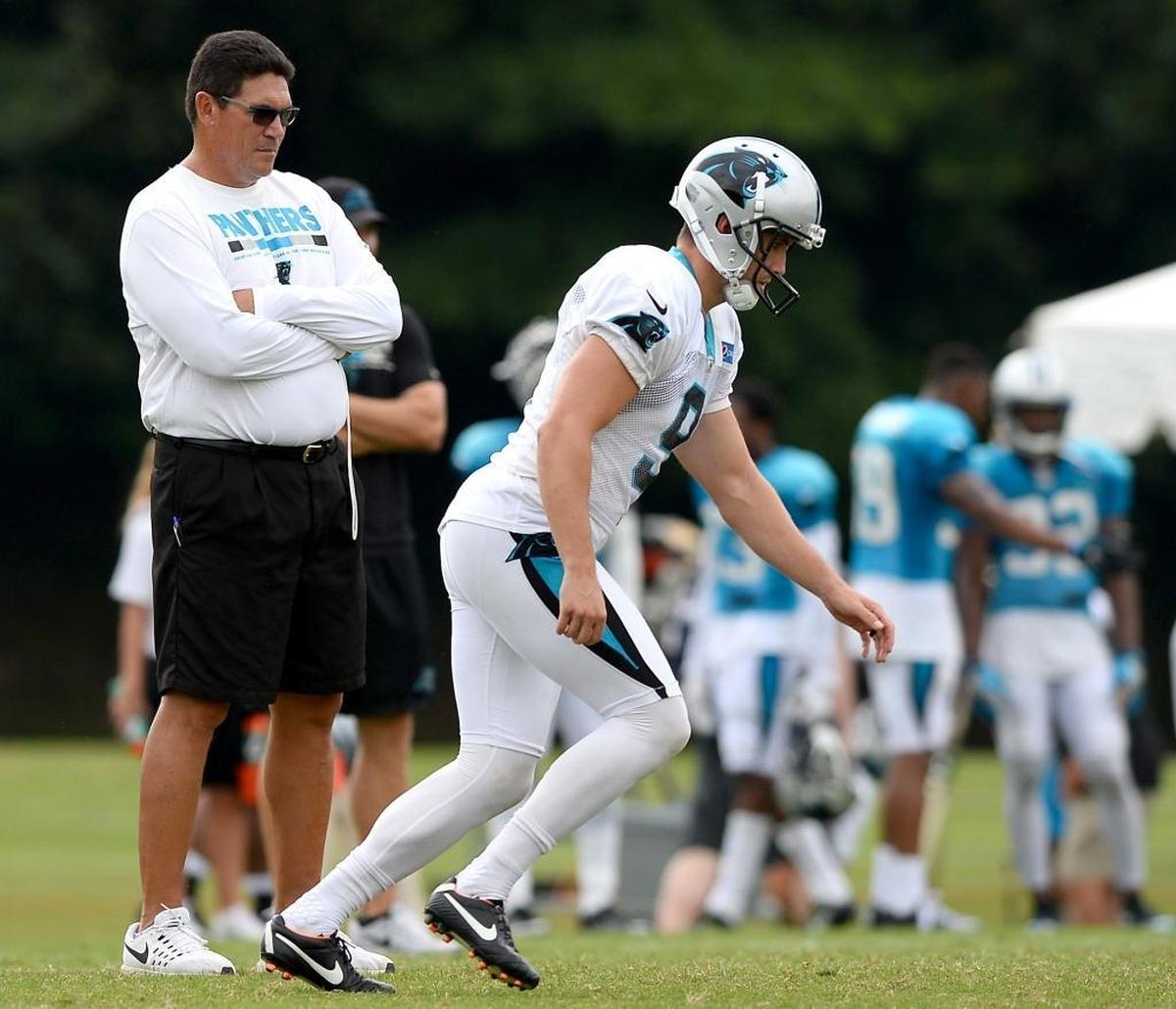 Carolina Panthers head coach Ron Rivera, left, said he is “very, very, very” pleased with kicker Graham Gano so far in training camp.