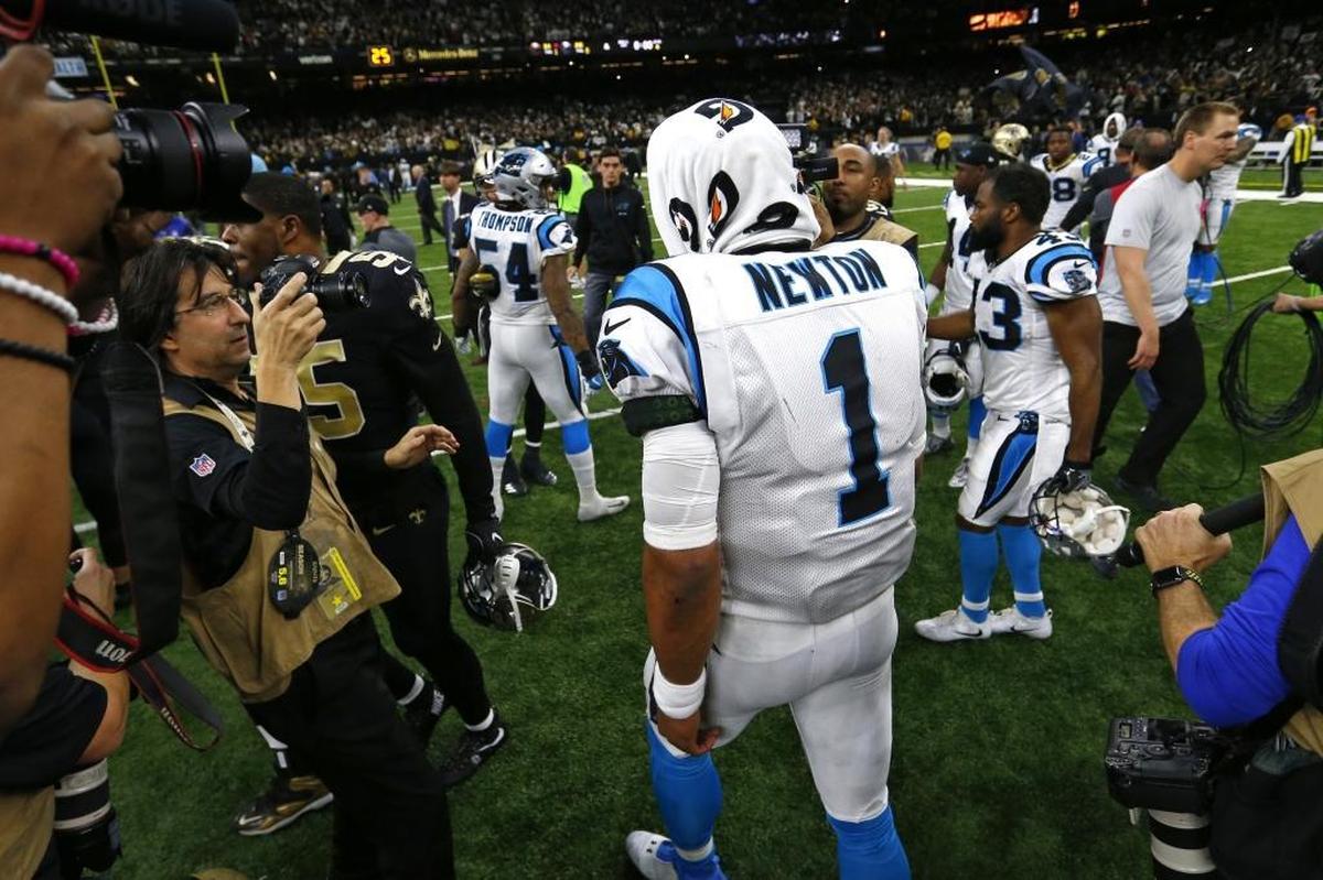 Carolina Panthers quarterback Cam Newton (1) walks off the field after an NFL wild card playoff football game against the New Orleans Saints in New Orleans, Sunday, Jan. 7, 2018. The Saints won 31-26, as Carolina’s final comeback attempt fell just short in what was likely the last game of the Jerry Richardson ownership era.