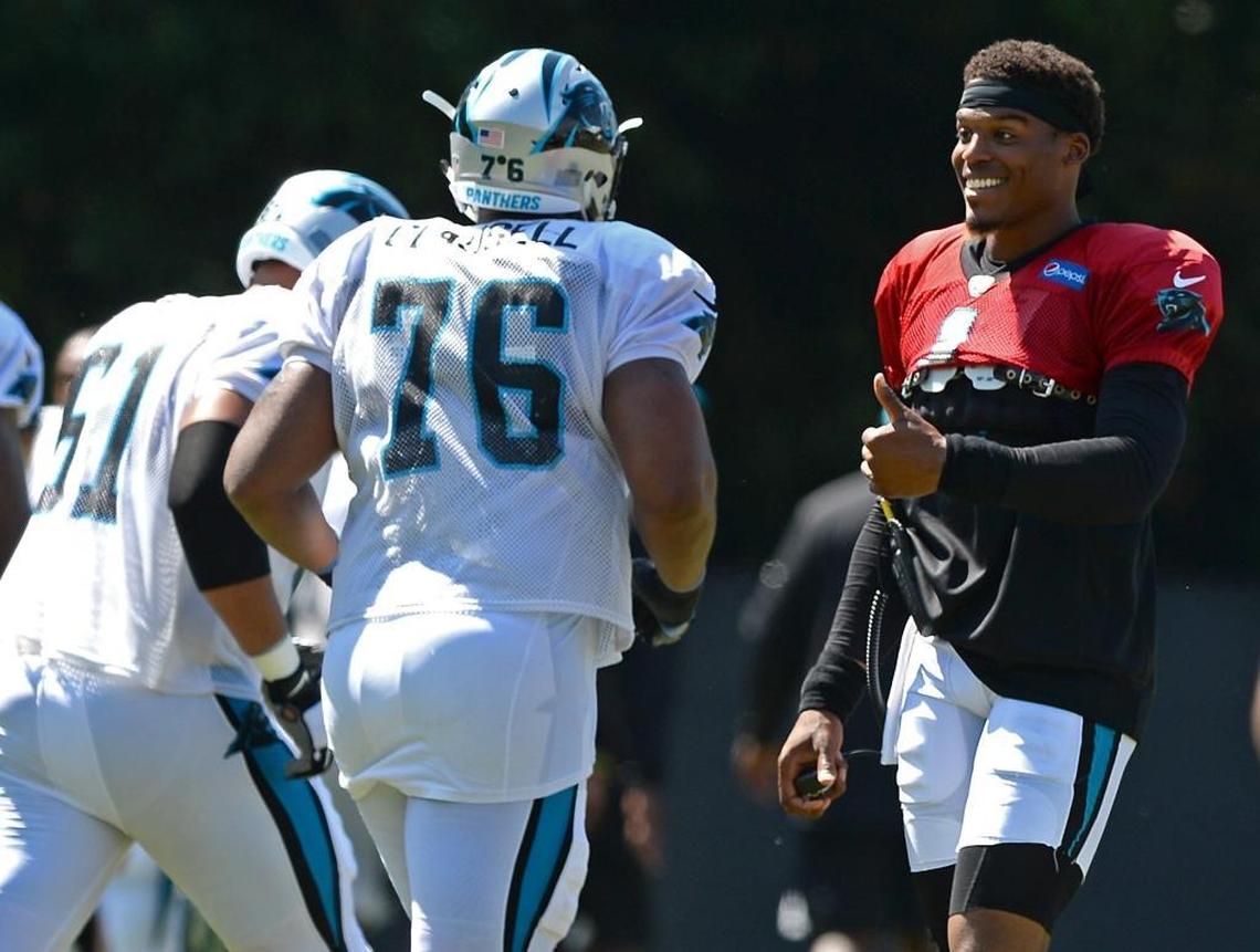 Carolina Panthers quarterback Cam Newton (1) was limited in Tuesday’s practice to handoffs and encouragement of his teammates at training camp in Spartanburg. Newton, who had offseason surgery, was experiencing soreness in his shoulder and did not attempt a pass during the session.
