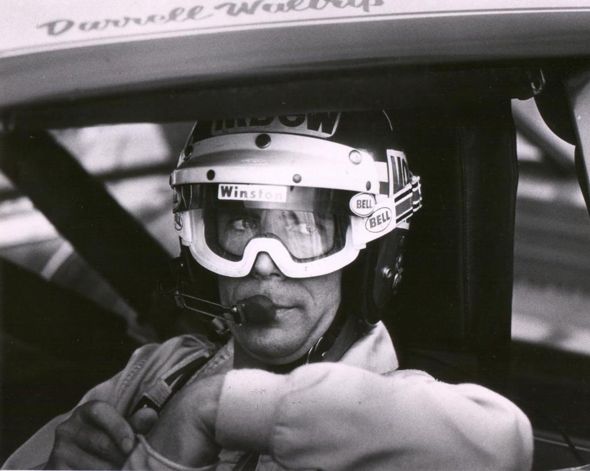 Darrell Waltrip had a hall of fame career as a driver before becoming a TV broadcaster for NASCAR races. This picture was taken before a race at Charlotte Motor Speedway in 1982.