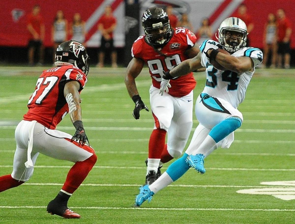 Carolina Panthers running back Cameron Artis-Payne breaks to the outside against the Atlanta Falcons during his rookie year of 2015.