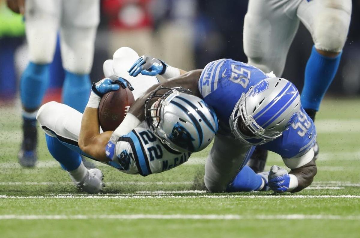One of the places running back Christian McCaffrey can improve is yards gained after first contact: Here he is slammed down by Detroit outside linebacker Tahir Whitehead in an Oct. 8th win for Carolina.