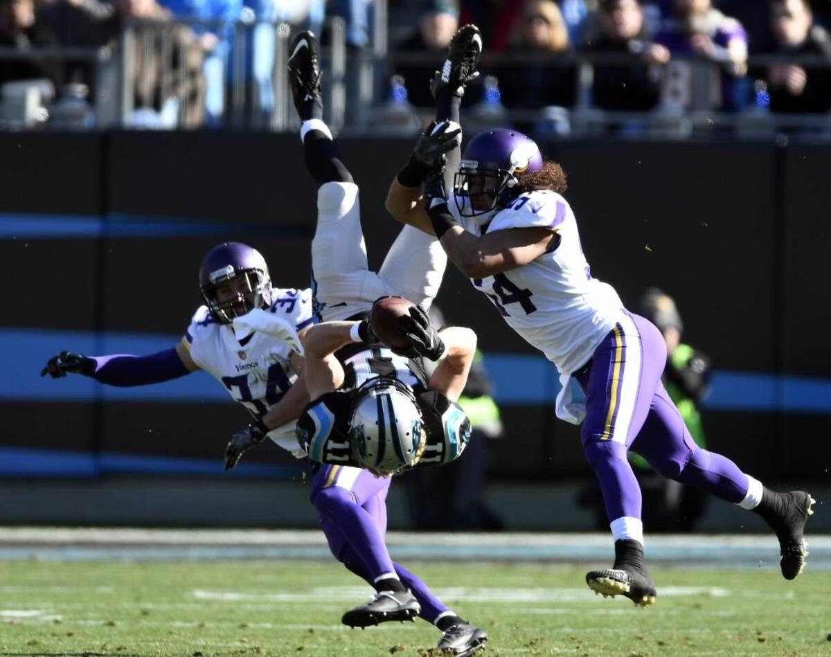 Carolina Panthers wide receiver Brenton Bersin (11) makes a reception in between Minnesota Vikings strong safety Andrew Sendejo (34) and middle linebacker Eric Kendricks (54) Sunday.