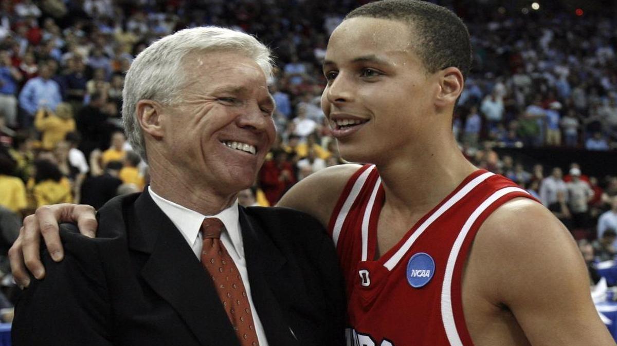 
Davidson head coach Bob McKillop and Stephen Curry (30) celebrate after Davidson edged Gonzaga in an NCAA tournament game in Raleigh in 2008. Curry had 40 points in the win. 
