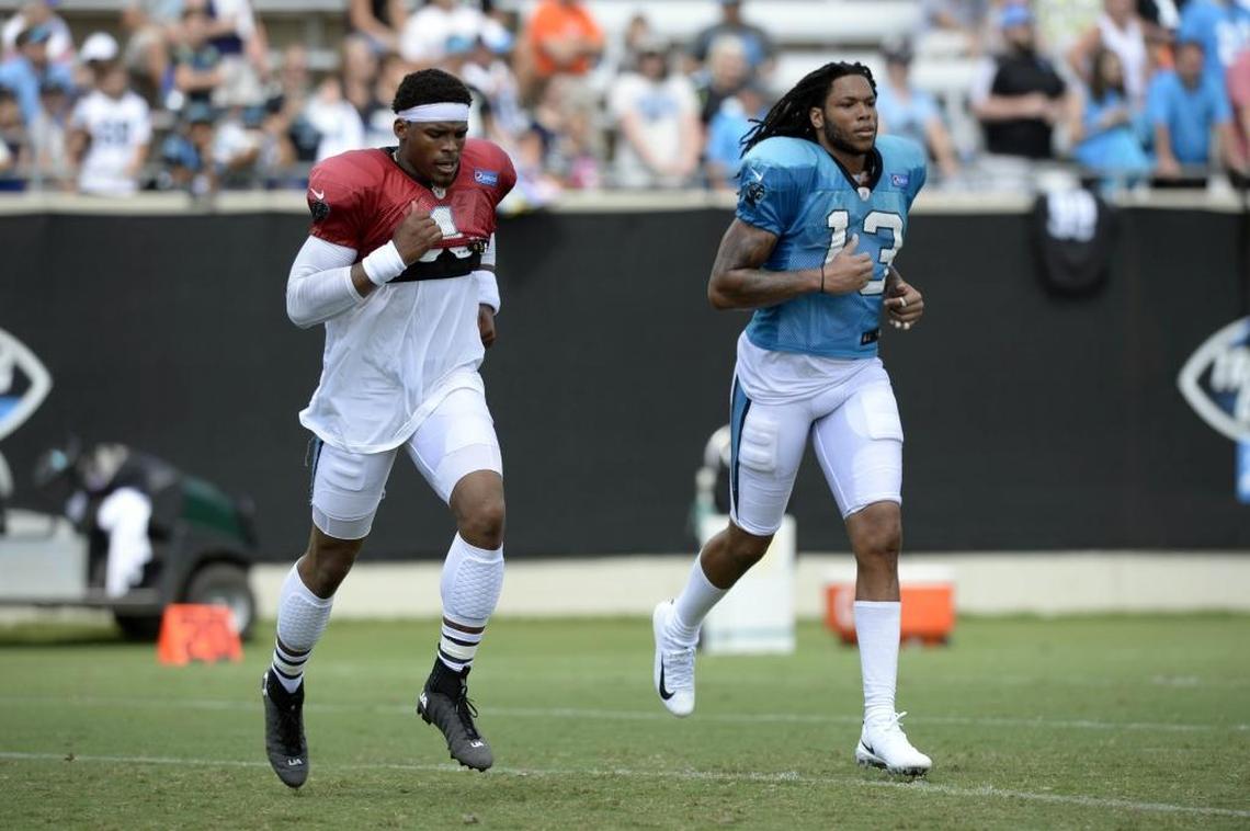 Carolina Panthers quarterback Cam Newton (left) and wide receiver Kelvin Benjamin ran together during training camp in August. Newton and Benjamin frequently hung out during camp, as they have for the past several years.